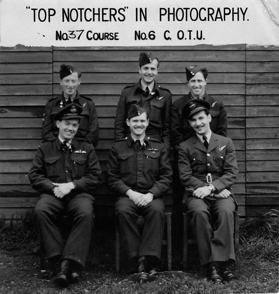 Top Notcher in Photography: Rear L to R: Firestone, Graham, Grandy; Front L to R: Deeth, Biddle, Neil